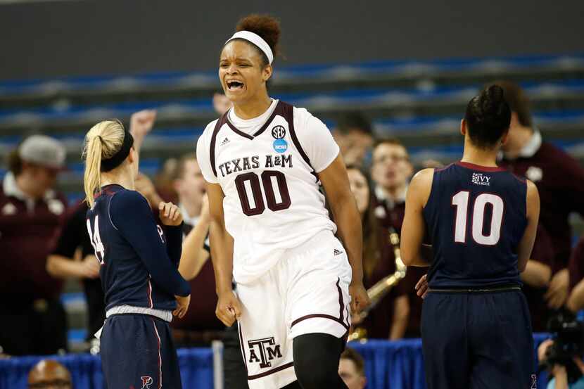 Texas A&M center Khaalia Hillsman celebrates after being fouled and still making her shot...