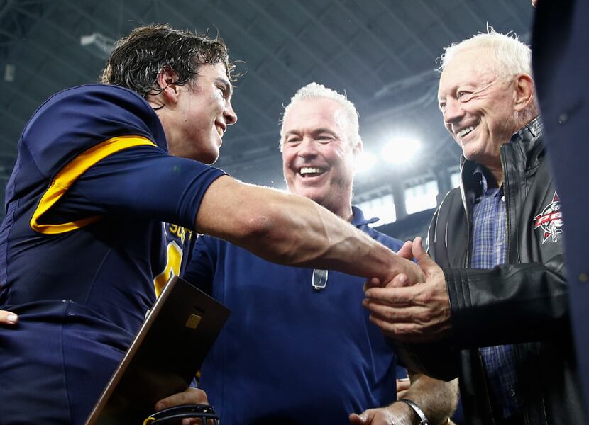 Highland Park quarterback John Stephen Jones, left, Jerry Jones, right and Stephen Jones,...