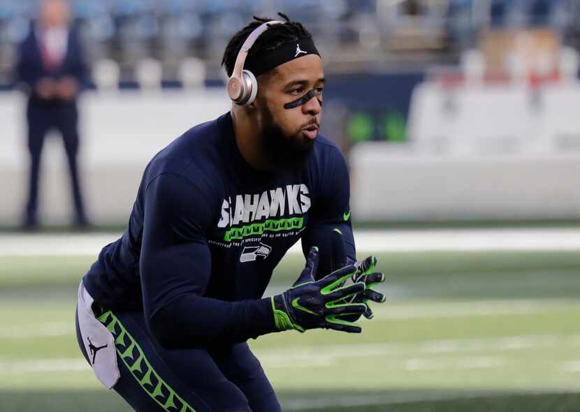 Seattle Seahawks free safety Earl Thomas warms up before an NFL football game against the...