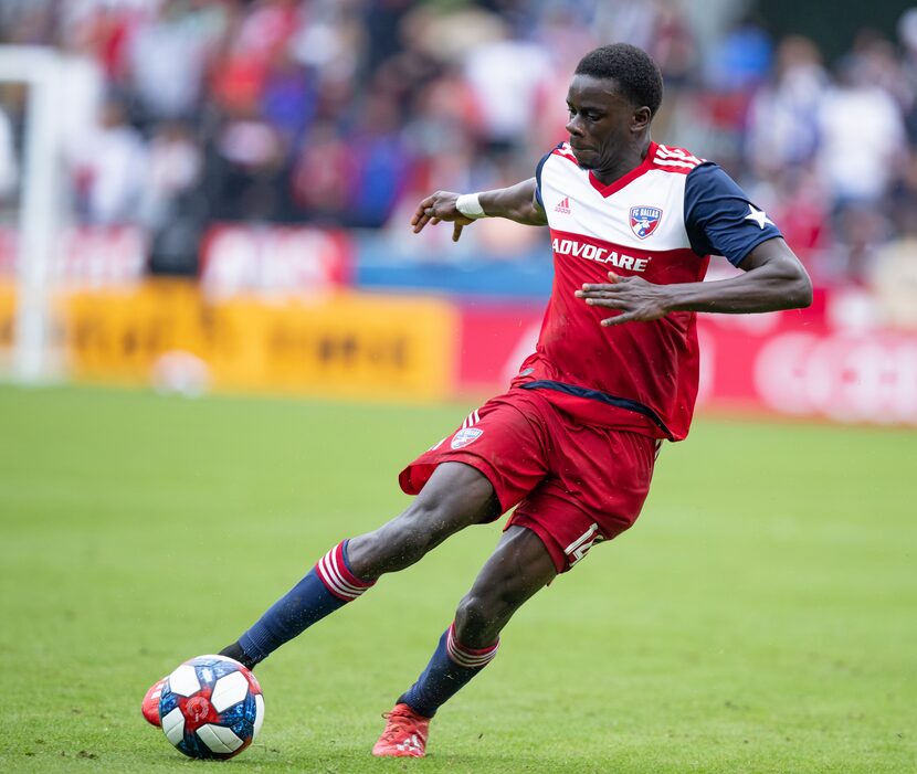 FRISCO, TX - MARCH 23: FC Dallas forward Dominique Badji (#14) controls the ball during the...