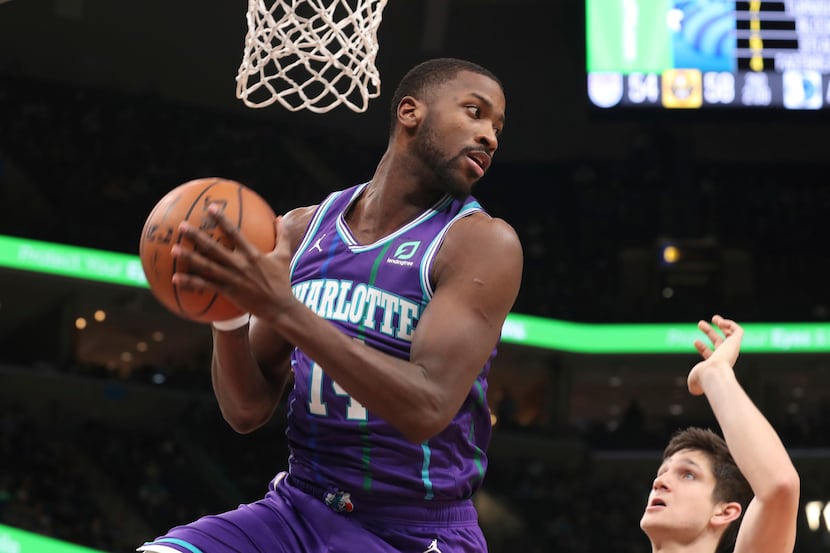 Charlotte Hornets forward Michael Kidd-Gilchrist (14) grabs a rebound in the first half of...