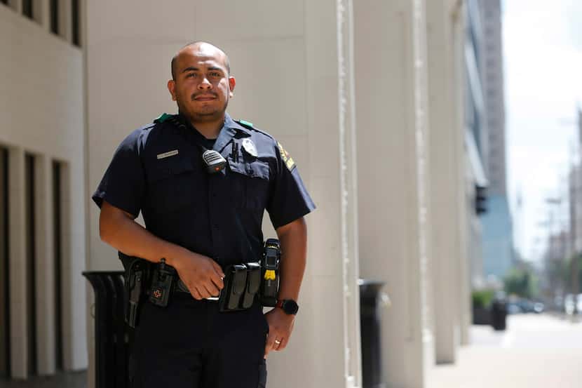 Dallas police Officer Jorge Barrientos poses for a portrait near El Centro College in...