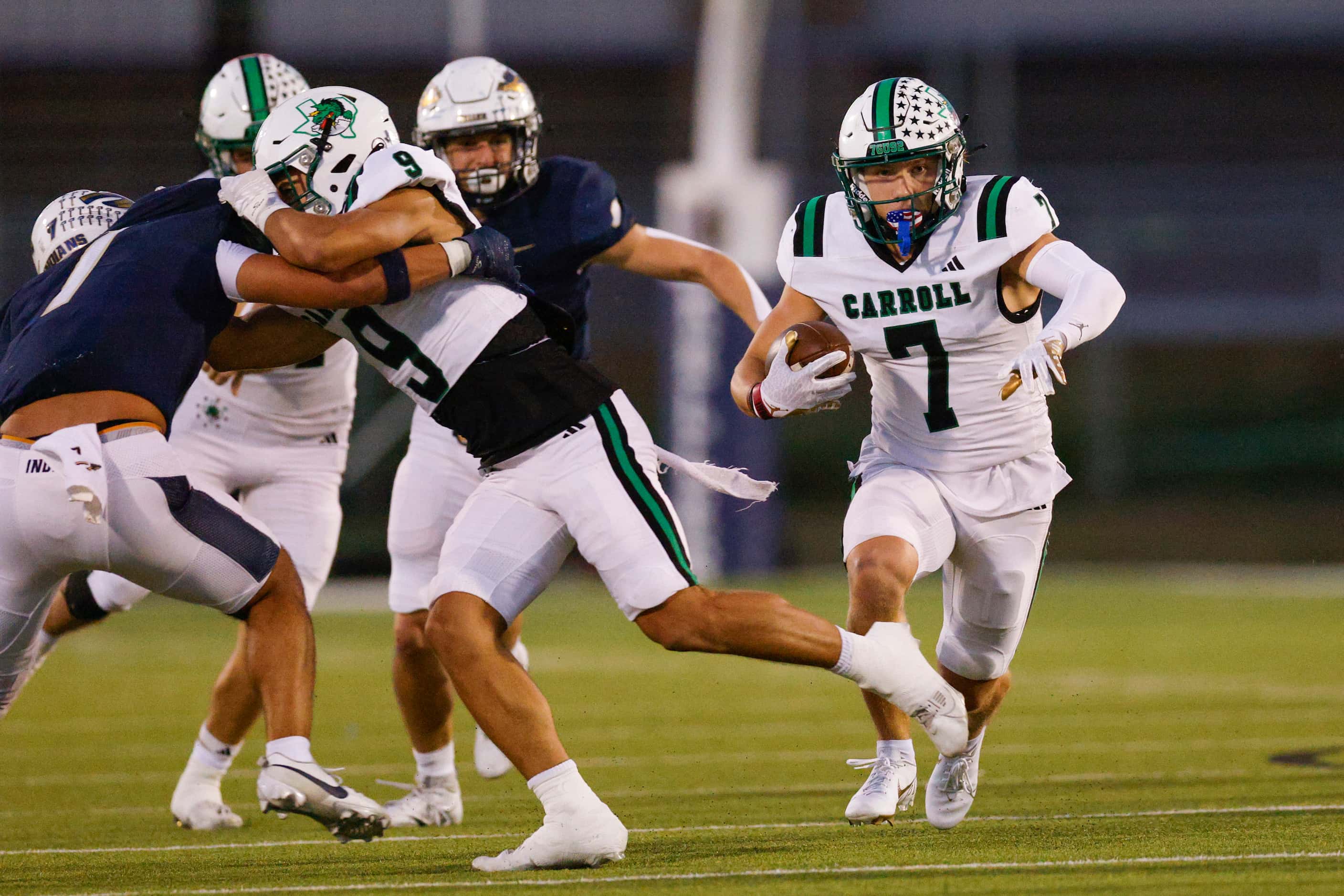 Southlake Carroll wide receiver Jacob Jordan (7) runs after a catch during the first half of...