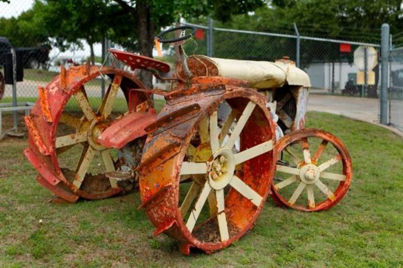 
Old farm equipment from Samuell Farm is parked among the relics resting in the Boneyard. 
