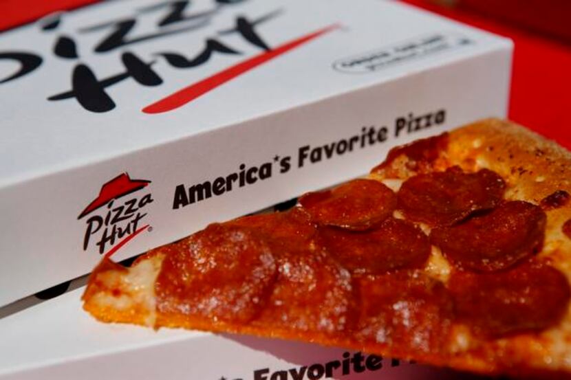 A pepperoni  pizza from a  Pizza  Hut restaurant, a unit of Yum! Brands Inc., is arranged...
