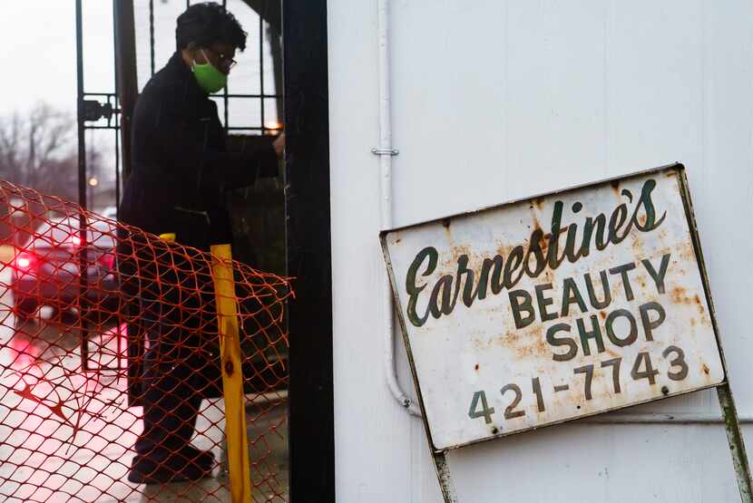 Earnestine Tarrant locks up after her final working day before retirement at her hair salon...