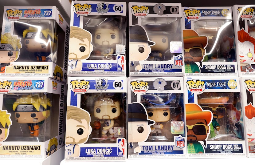 Funko Pop! figures, including Dallas Mavericks Luka Doncic and former Dallas Cowboys coach...