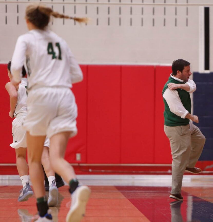 Greenhill head coach Darryn Sandler reacts after his team missed a scoring opportunity...