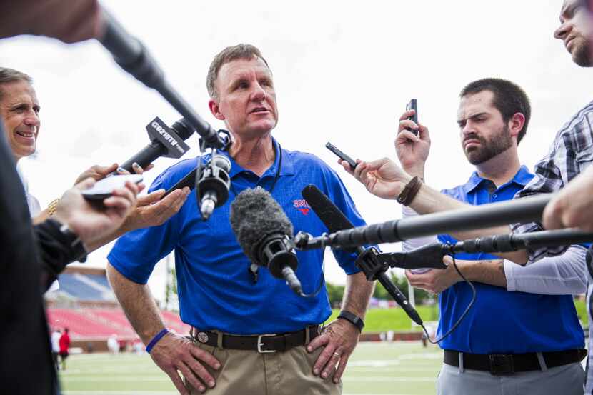 Southern Methodist Mustangs head coach Chad Morris answers media questions before their...