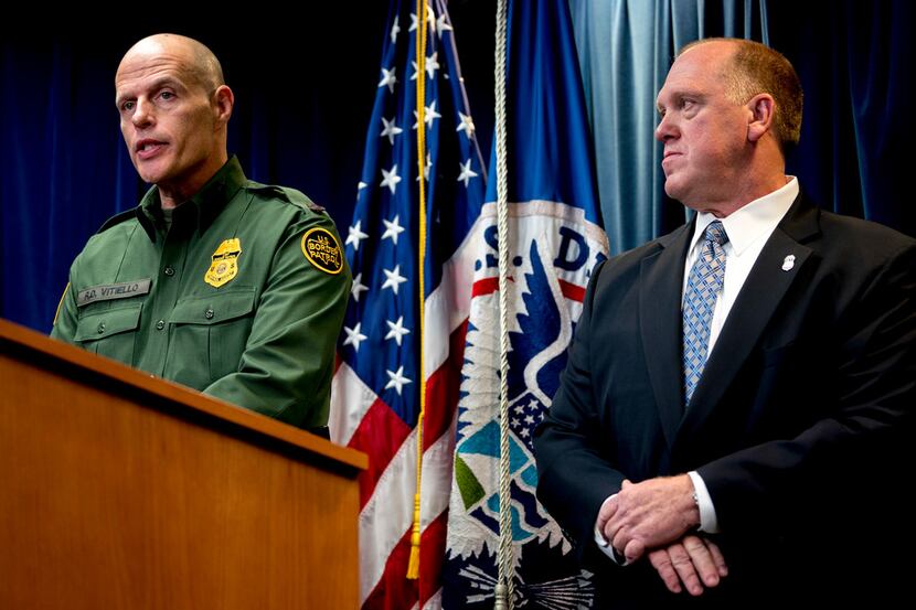 U.S. Customs and Border Protection's acting deputy commissioner, Ronald Vitiello, (left)...