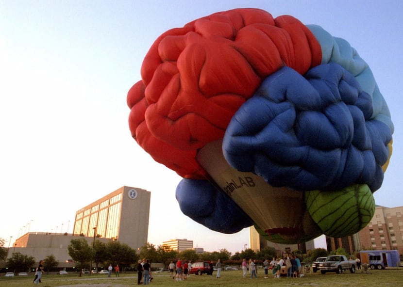A hot air balloon in the shape of a human brain was inflated Wednesday July 4, 2001 at the...