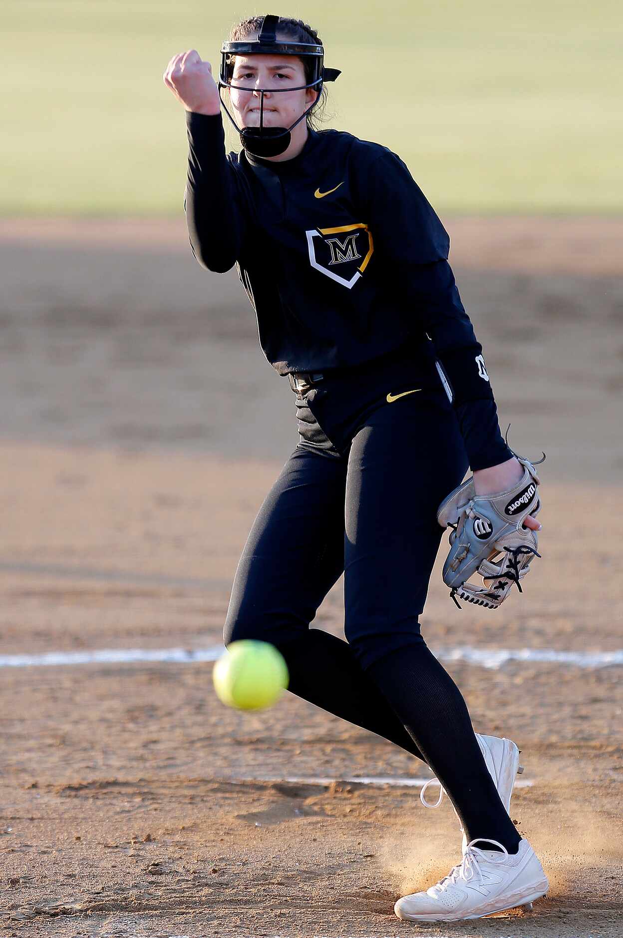 Memorial pitcher Maddie Muller (13) delivers a pitch in the first inning as Heritage High...