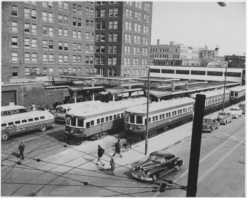 Electric trains line up outside downtown Dallas' Interurban Building in the
1940s. 