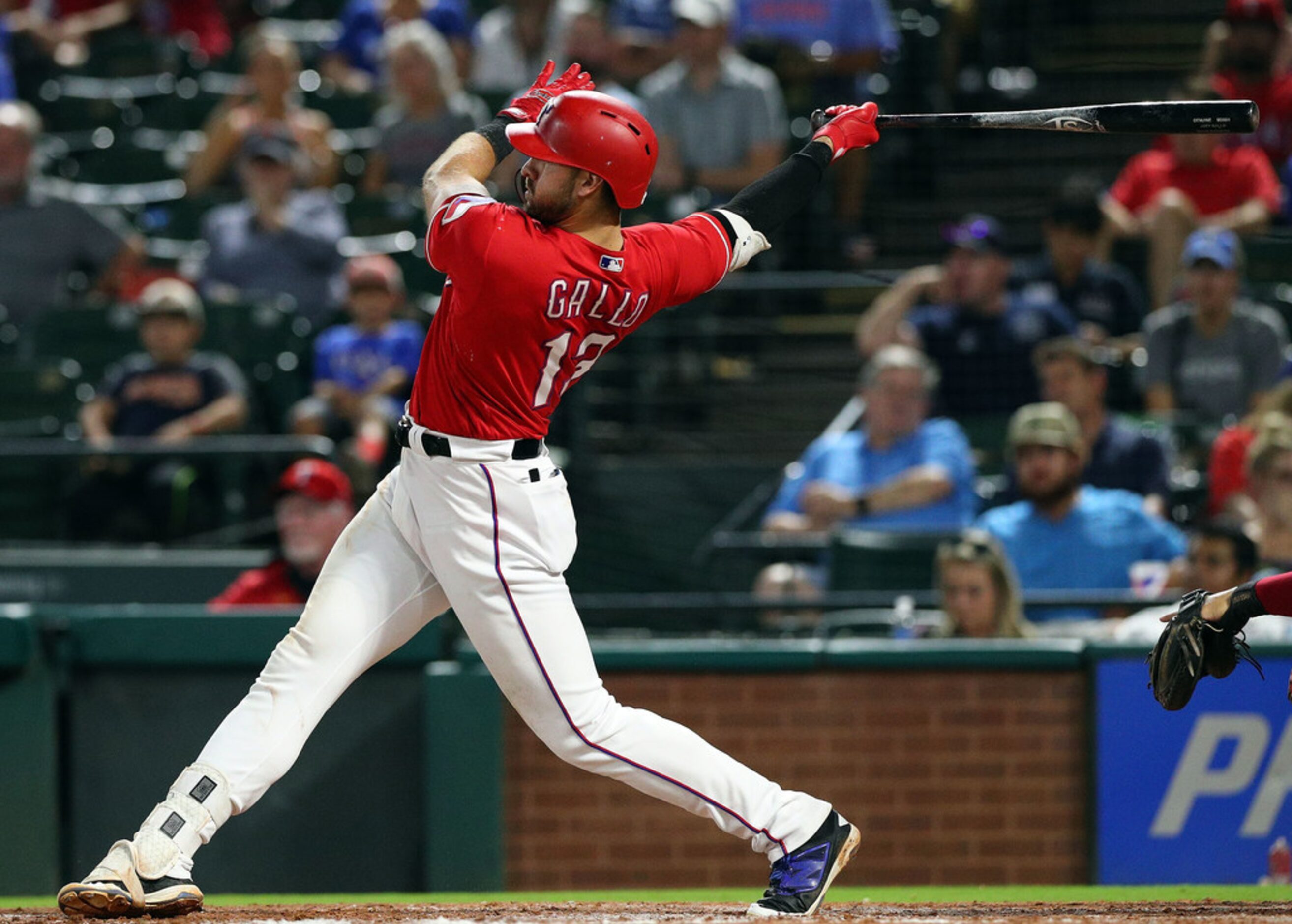 ARLINGTON, TX - SEPTEMBER 03:  Joey Gallo #13 of the Texas Rangers hits for an RBI double in...