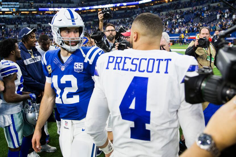 Dallas Cowboys quarterback Dak Prescott (4) greets Indianapolis Colts quarterback Andrew...