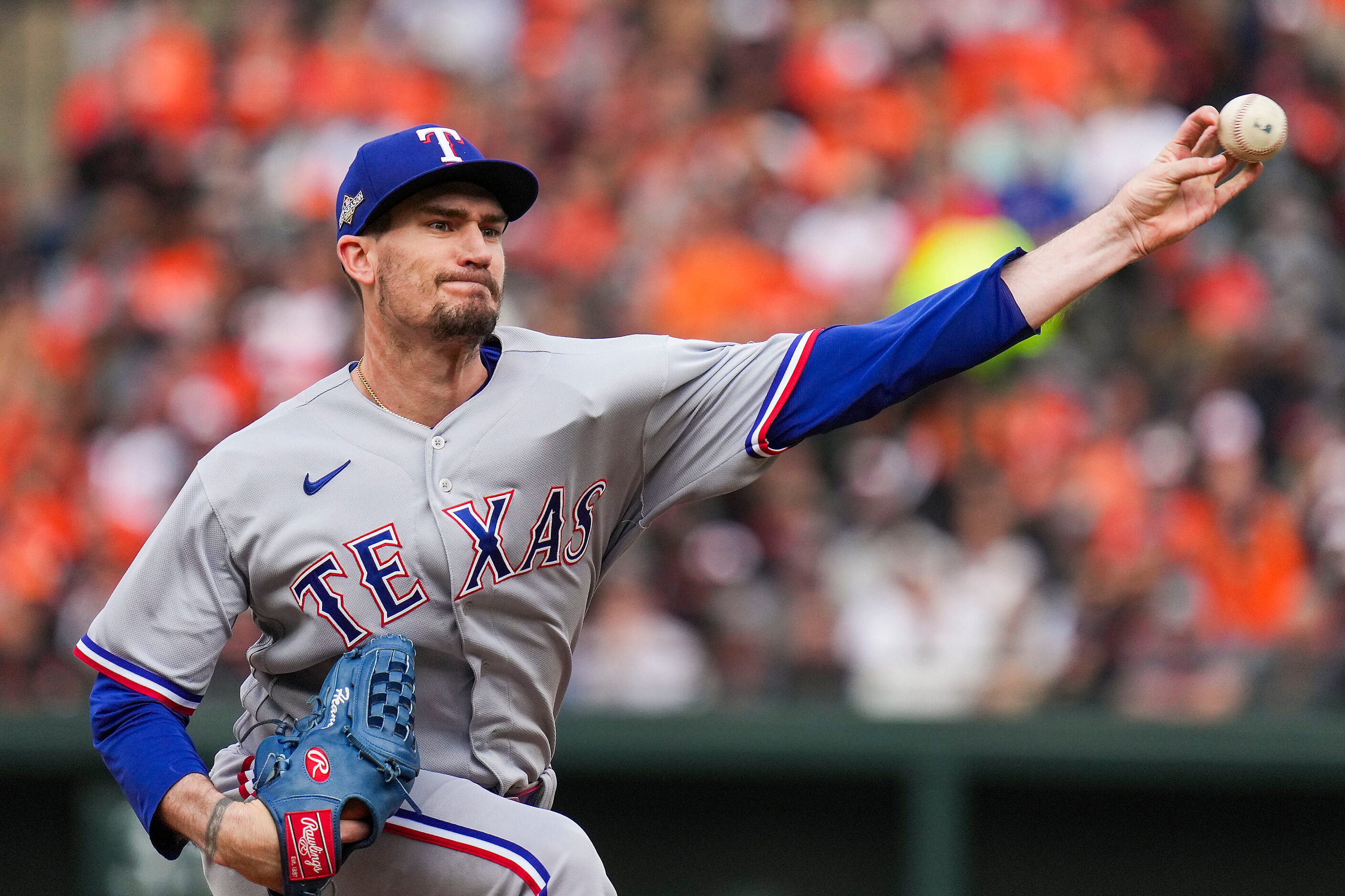 Texas Rangers starting pitcher Andrew Heaney (44) delivers during the first inning Game 1 of...