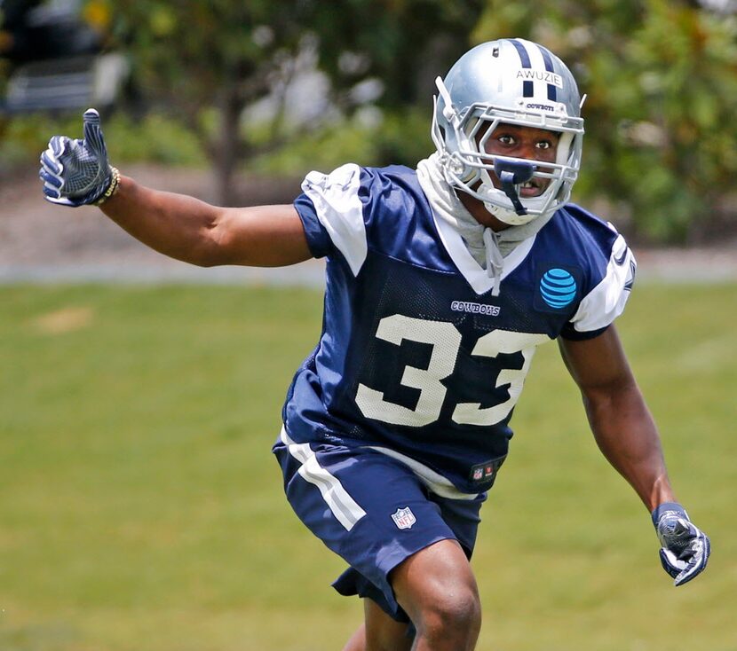 Dallas rookie cornerback Chidobe Awuzie (33) is pictured during drills at Cowboys rookie...