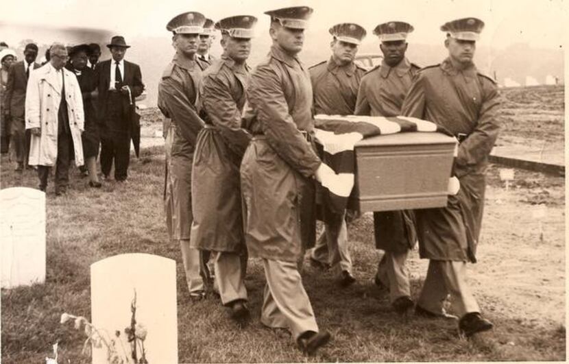 Cleo Hearn (second from right), carries a casket during a military burial in 1962. Hearn was...