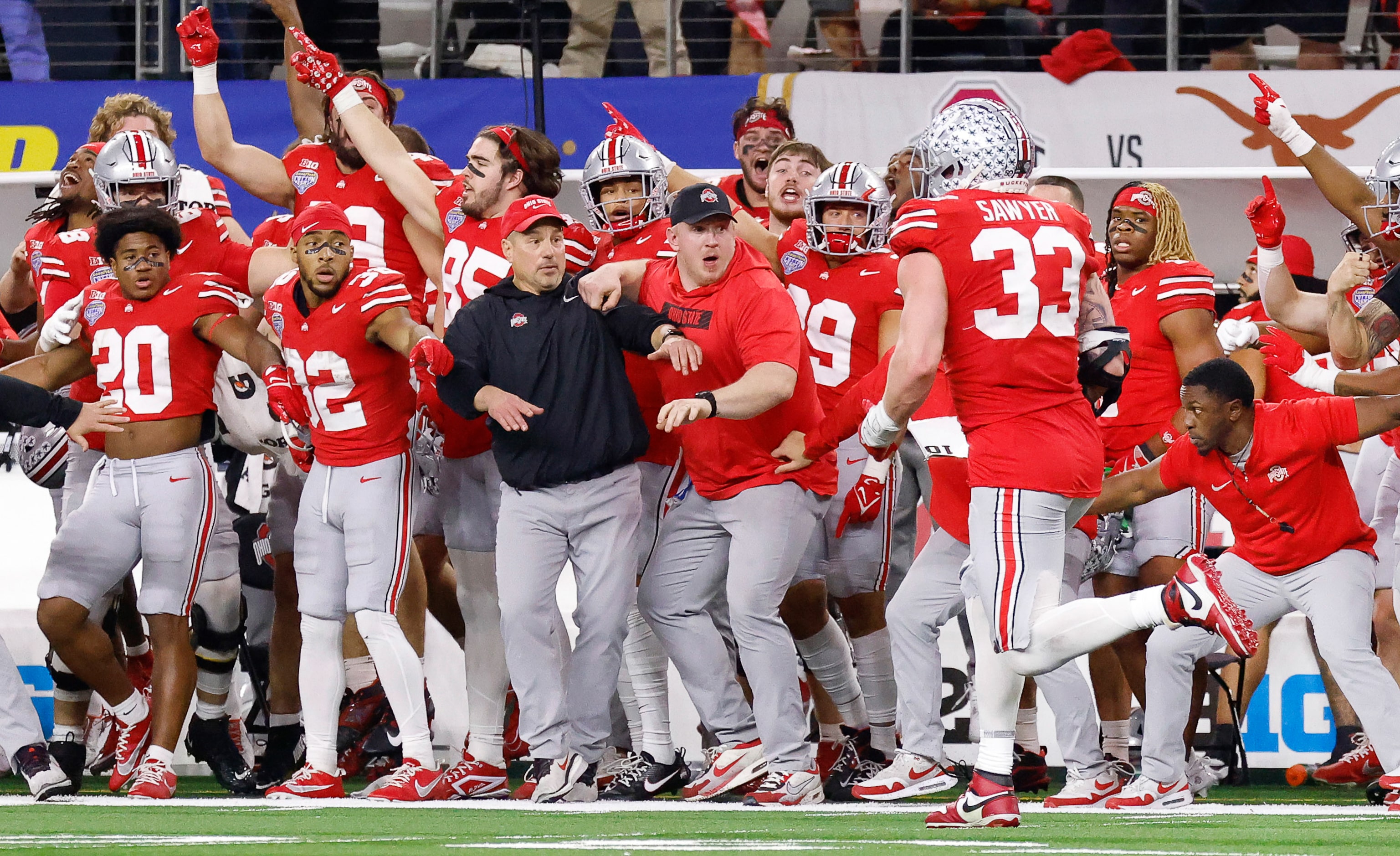 Ohio State Buckeyes defensive end Jack Sawyer (33) returns a fourth quarter fumble by Texas...