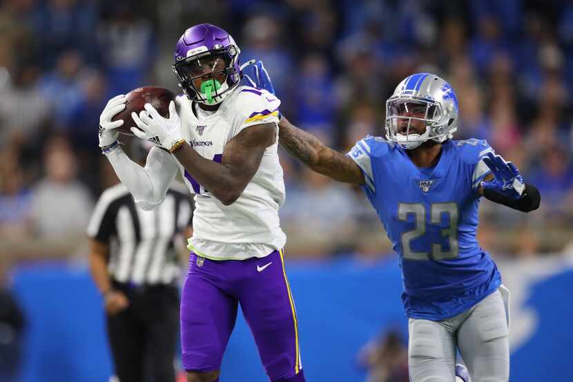DETROIT, MICHIGAN - OCTOBER 20: Stefon Diggs #14 of the Minnesota Vikings catches a pass in...