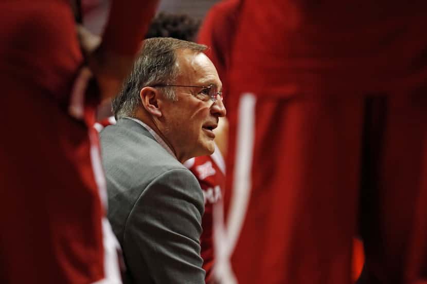 Oklahoma coach Lon Kruger talks to his players during a timeout in the second half of the...
