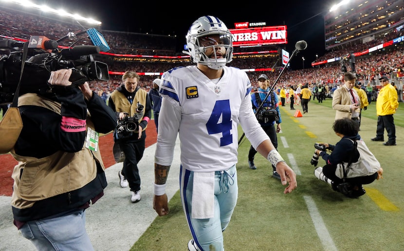 Dallas Cowboys quarterback Dak Prescott (4) walks off the field following their loss to the...