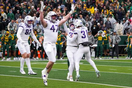 TCU kicker Griffin Kell (39) celebrates with teammates Jordy Sandy (31), Carter Ware (47)...