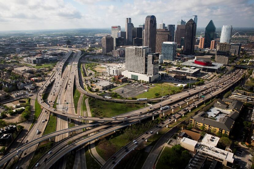 The downtown skyline, photographed from above the interchange of US-75 at Woodall Rogers on...