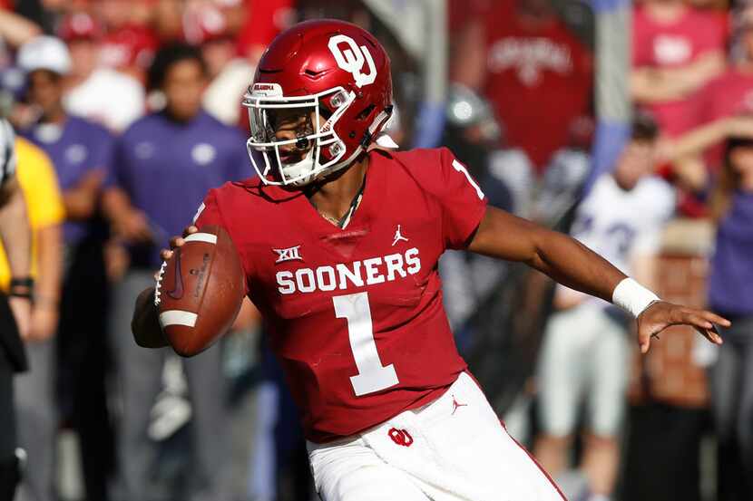 File - In this Oct. 27, 2018, file photo, Oklahoma quarterback Kyler Murray maneuvers during...