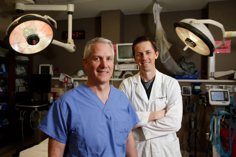 Medical City Plano doctors Al West (left), trauma surgeon, and Mark Gamber, emergency...