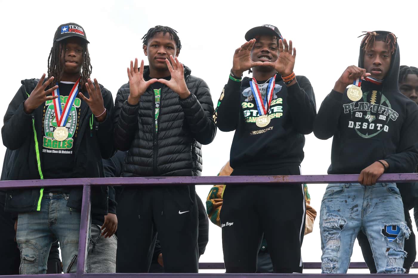 DeSoto High School football players pose on top of a double-decker trailer, Saturday, Jan....