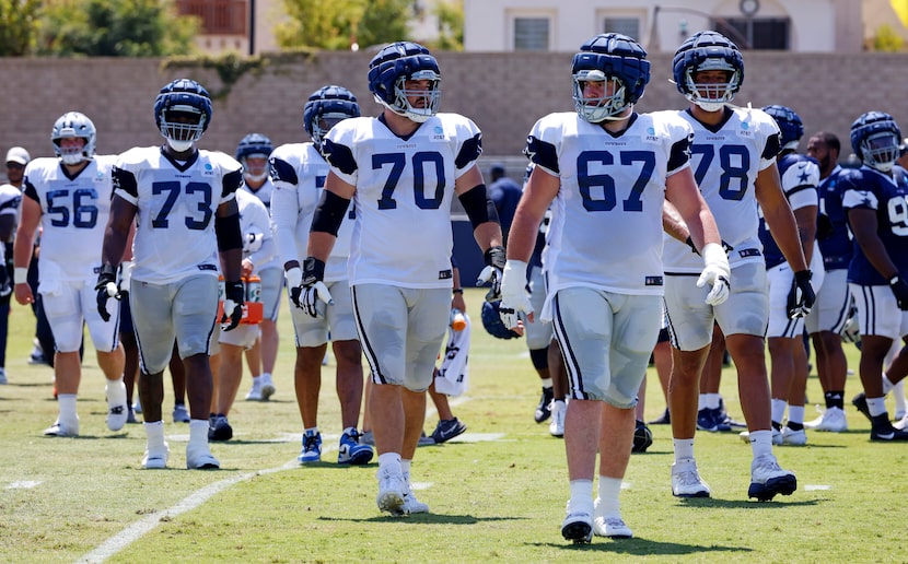 (From left) Dallas Cowboys offensive lineman Cooper Beebe (56), Tyler Smith (73), Zack...