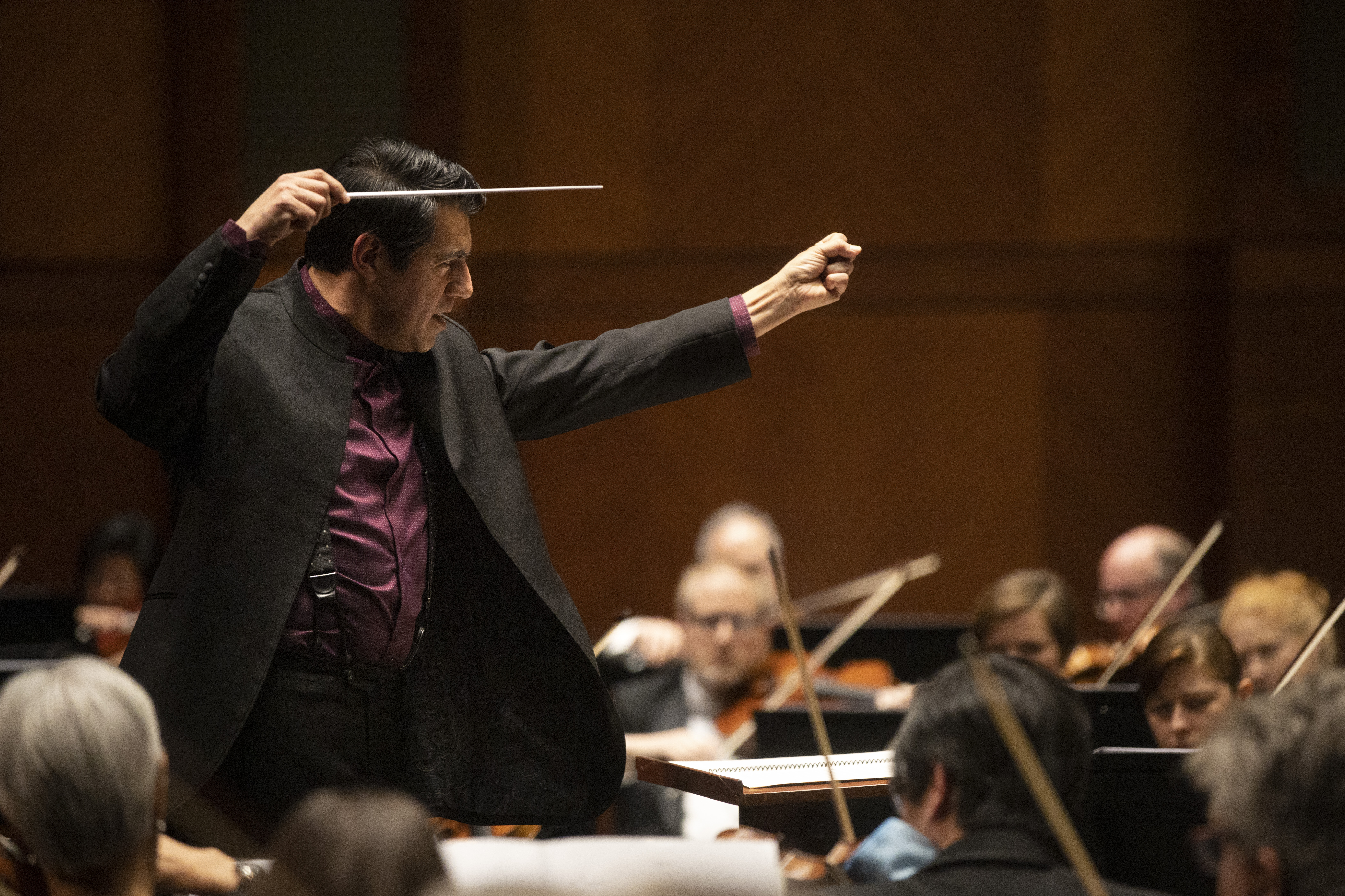 Conductor Miguel Harth-Bedoya leads the Fort Worth Symphony Orchestra in 'Clockworking' by...