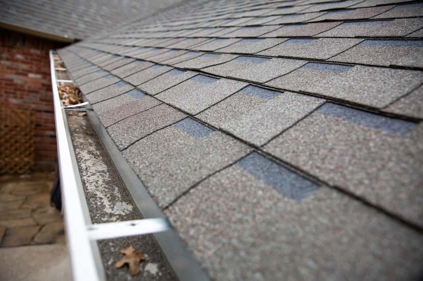 Granules from shingles collecting in Herb Hollis' roof are an indication that his roof is...