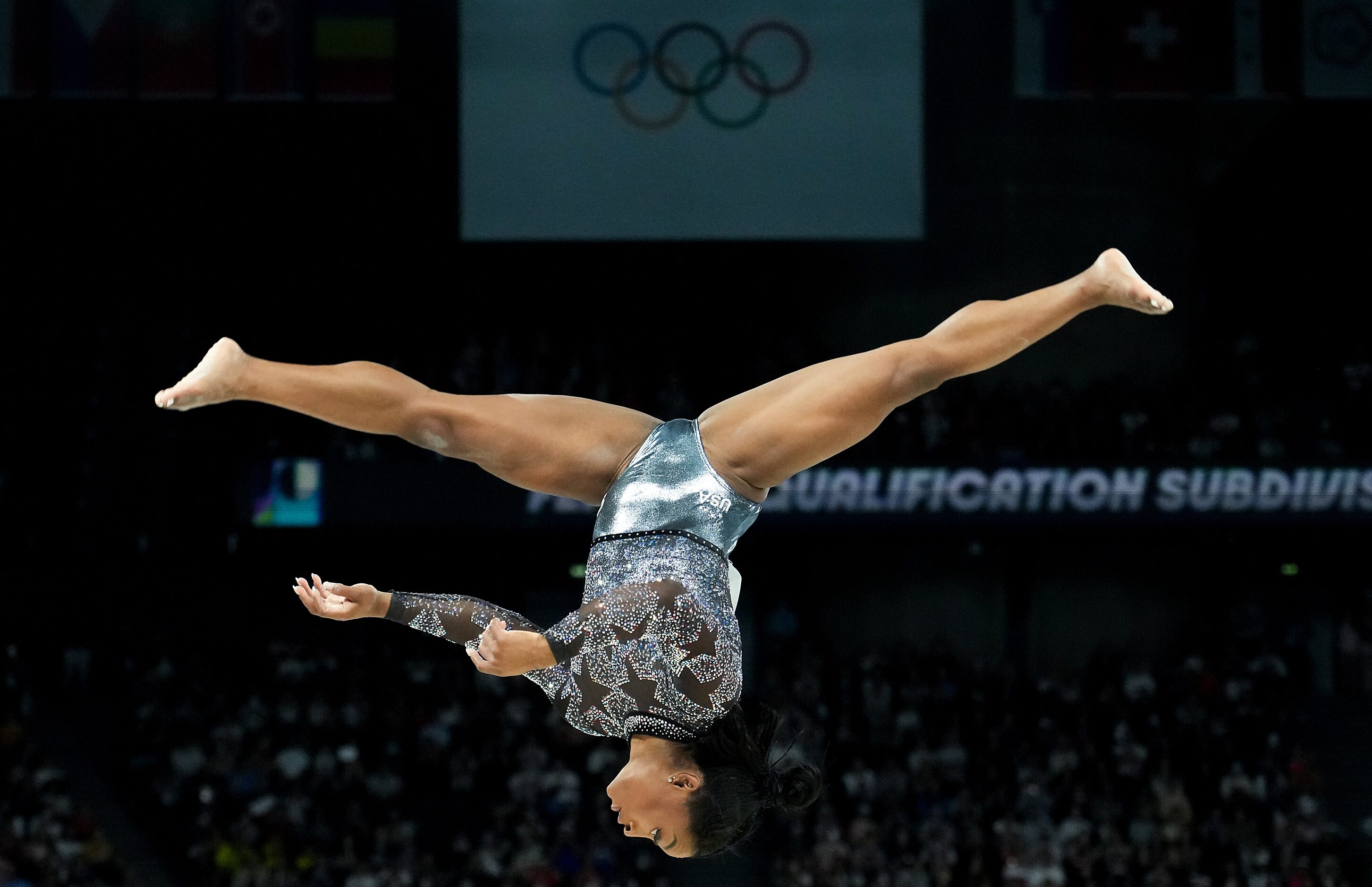 Simone Biles of the United States competes on the balance beam during women’s gymnastics...