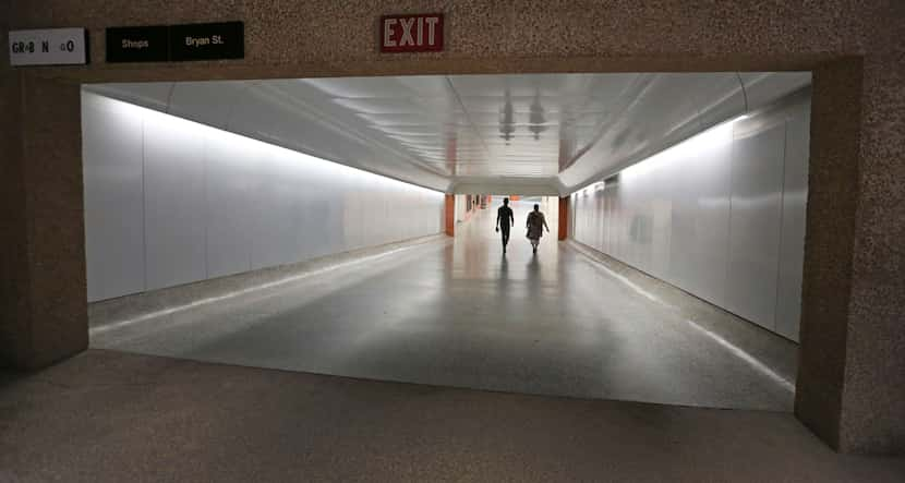 Meyer and Alexander on a tour of the underground tunnels, heading toward Thanks-Giving Square.