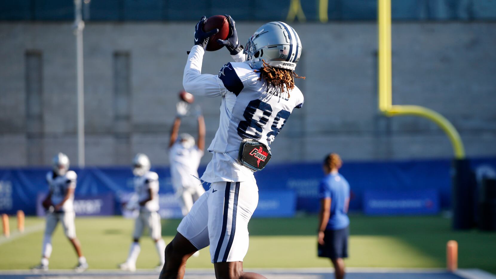 Dallas Cowboys wide receiver CeeDee Lamb (88) catches a pass in the end zone during a drill...