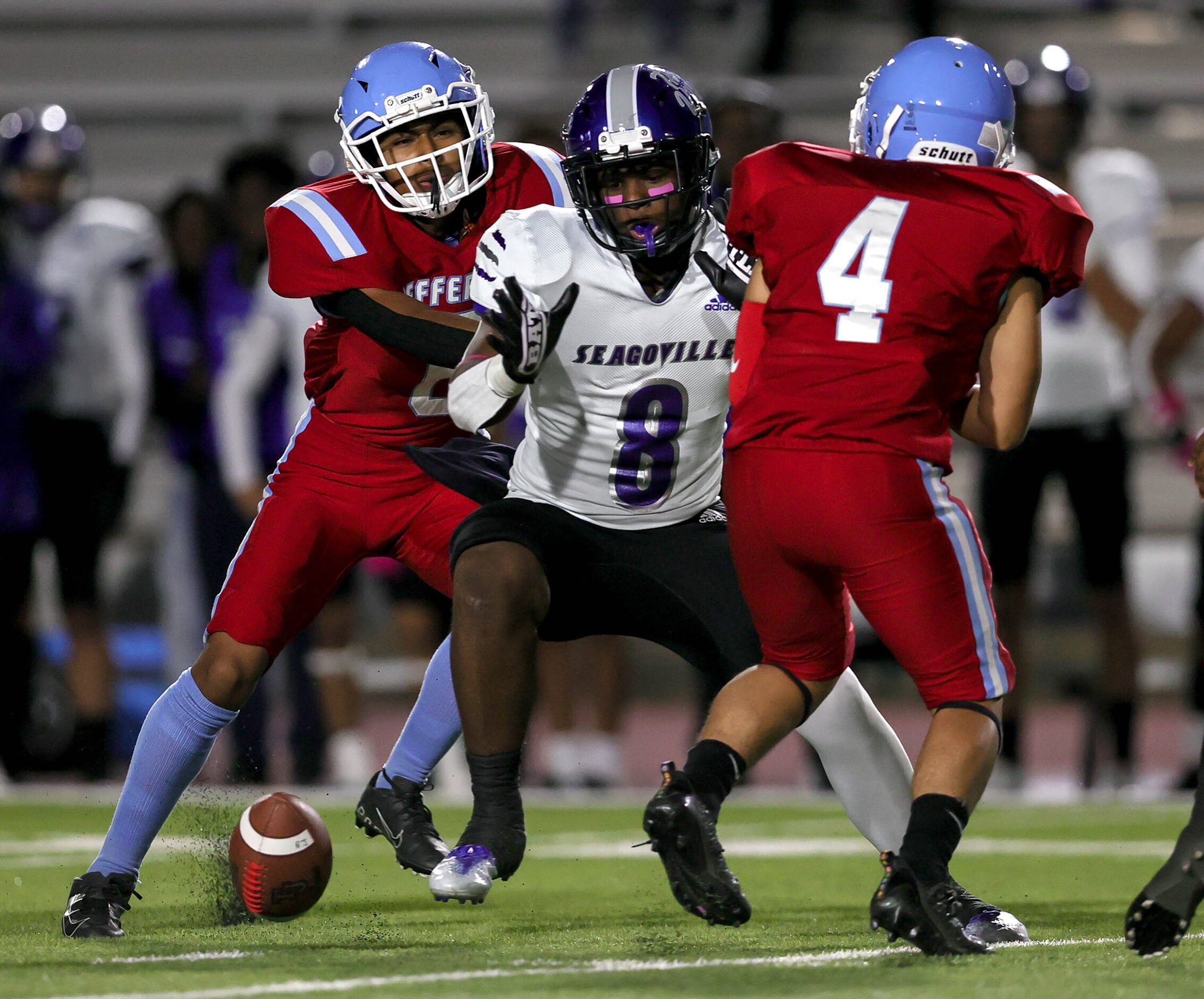 Thomas Jefferson running back Jovani Soberanes (4) fumbles the ball against Seagoville...