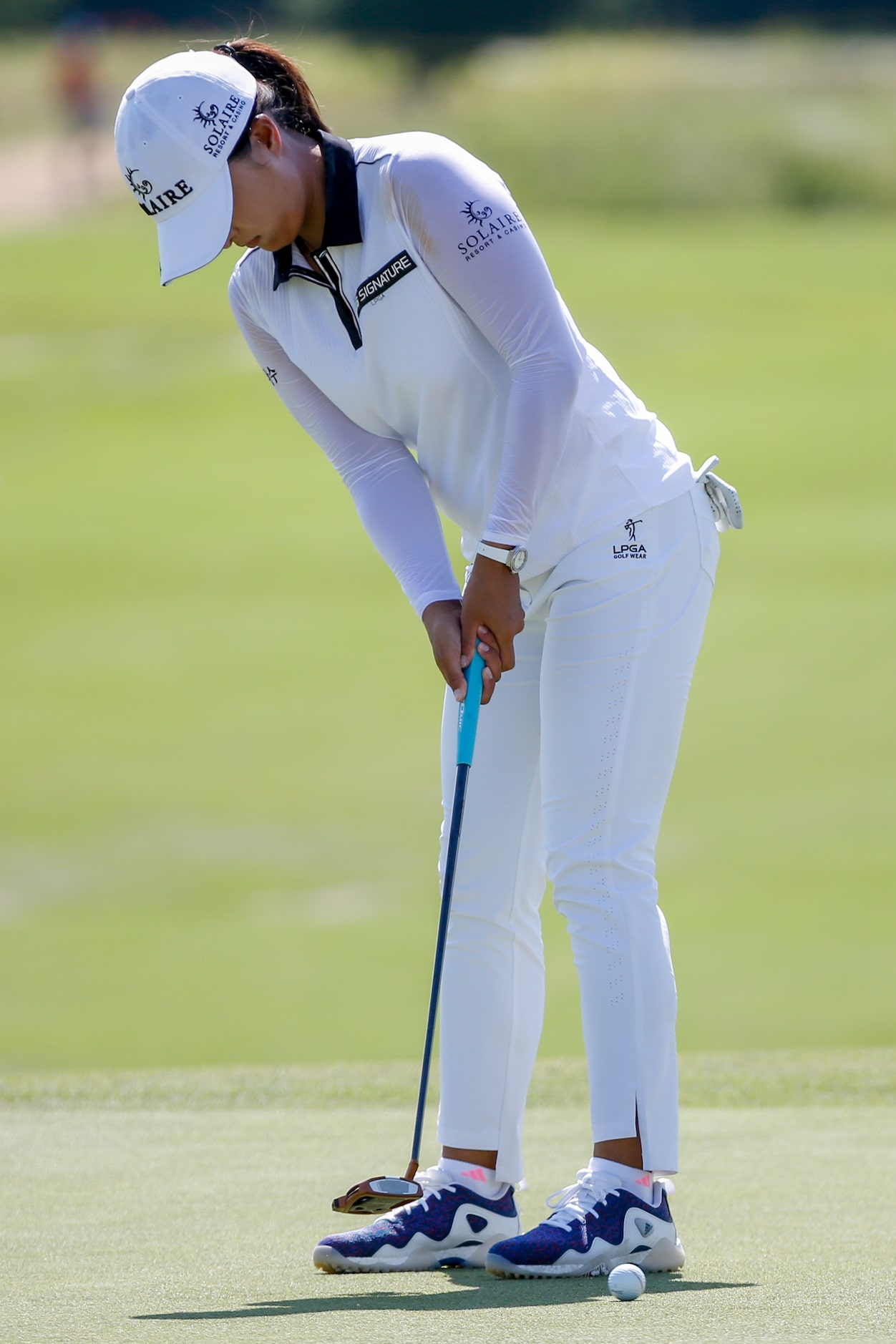 Professional golfer Jin Young Ko puts on the 18th green during round one of the LPGA VOA...