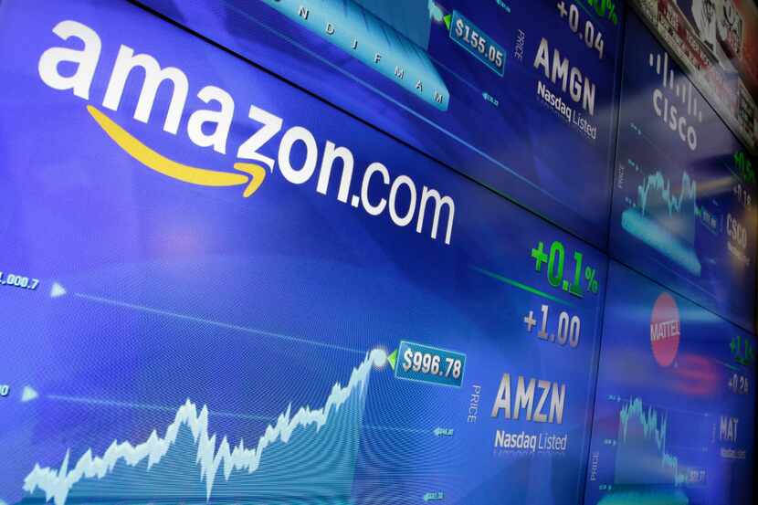 FILE - In this Tuesday, May 30, 2017, file photo, the Amazon logo is displayed at the Nasdaq...