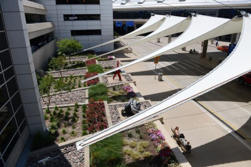 Sculptures displayed in partnership with the Nasher Sculpture Center sit outside the...