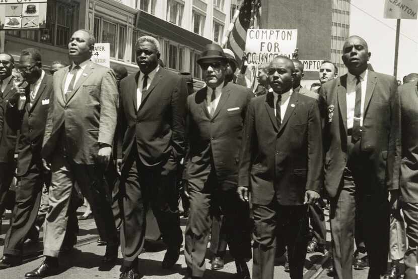 Jackie Robinson (middle with left hand in pocket) was among 35,000 demonstrators for civil...