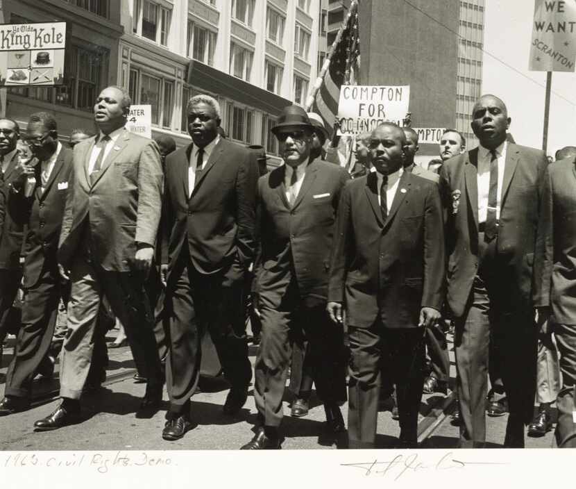Jackie Robinson (middle with left hand in pocket) was among 35,000 demonstrators for civil...
