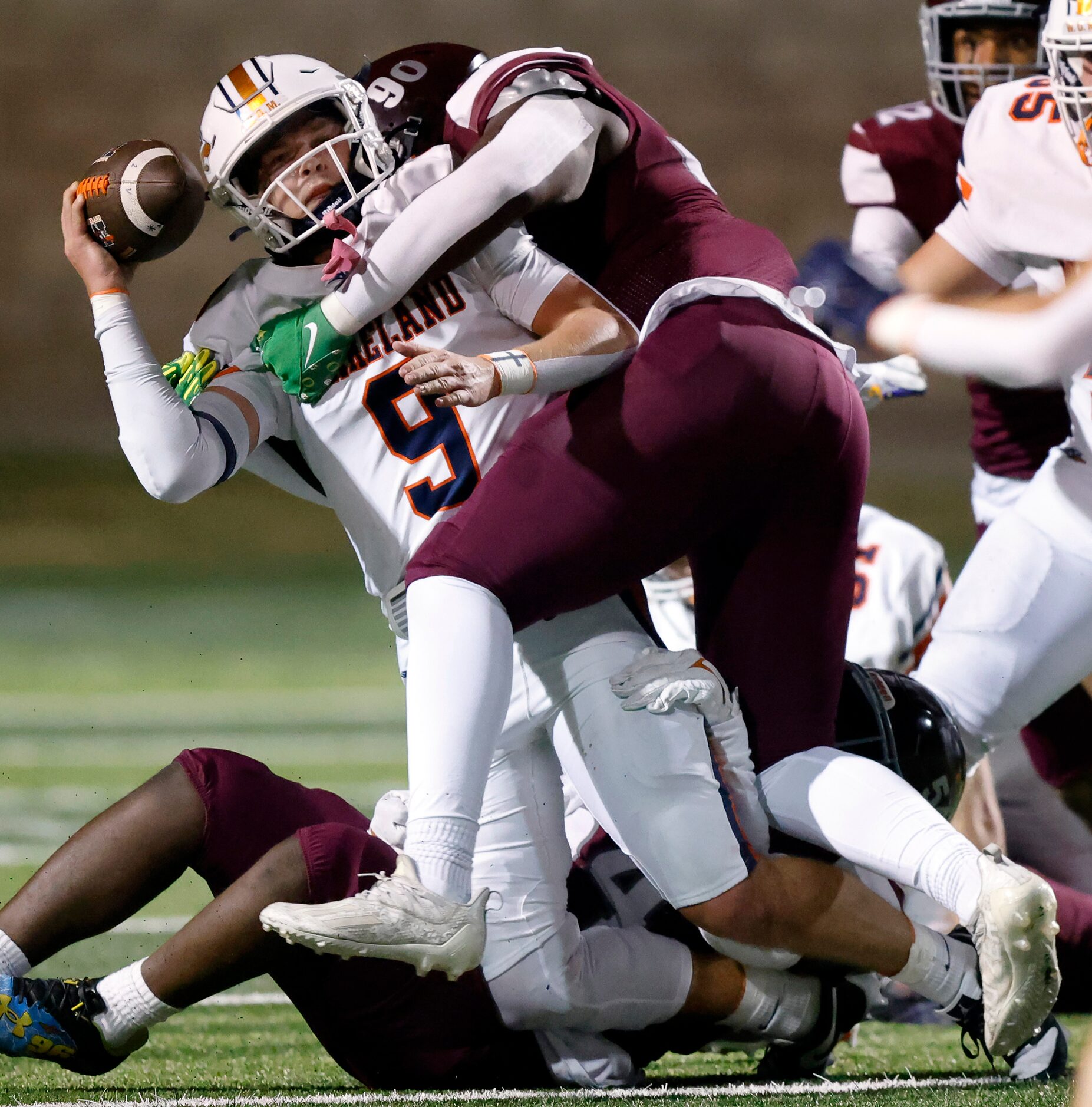 Frisco Wakeland quarterback Brennan Myer (9) is sacked by Mansfield Timberview defensive...