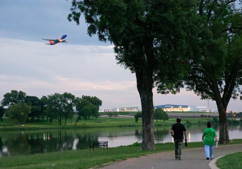 People walk on the northern side of Bachman Lake Park. Among the five options short-listed...