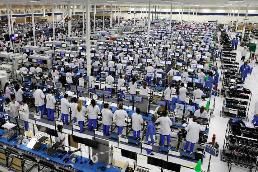 Workers man the Motorola smartphone plant in Fort Worth, Texas.