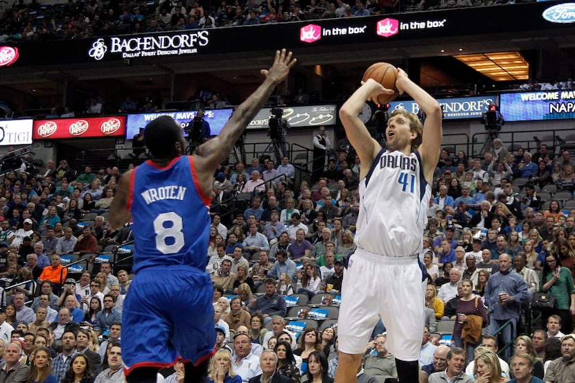 Dallas Mavericks power forward Dirk Nowitzki (41) shoots over Philadelphia 76ers shooting...