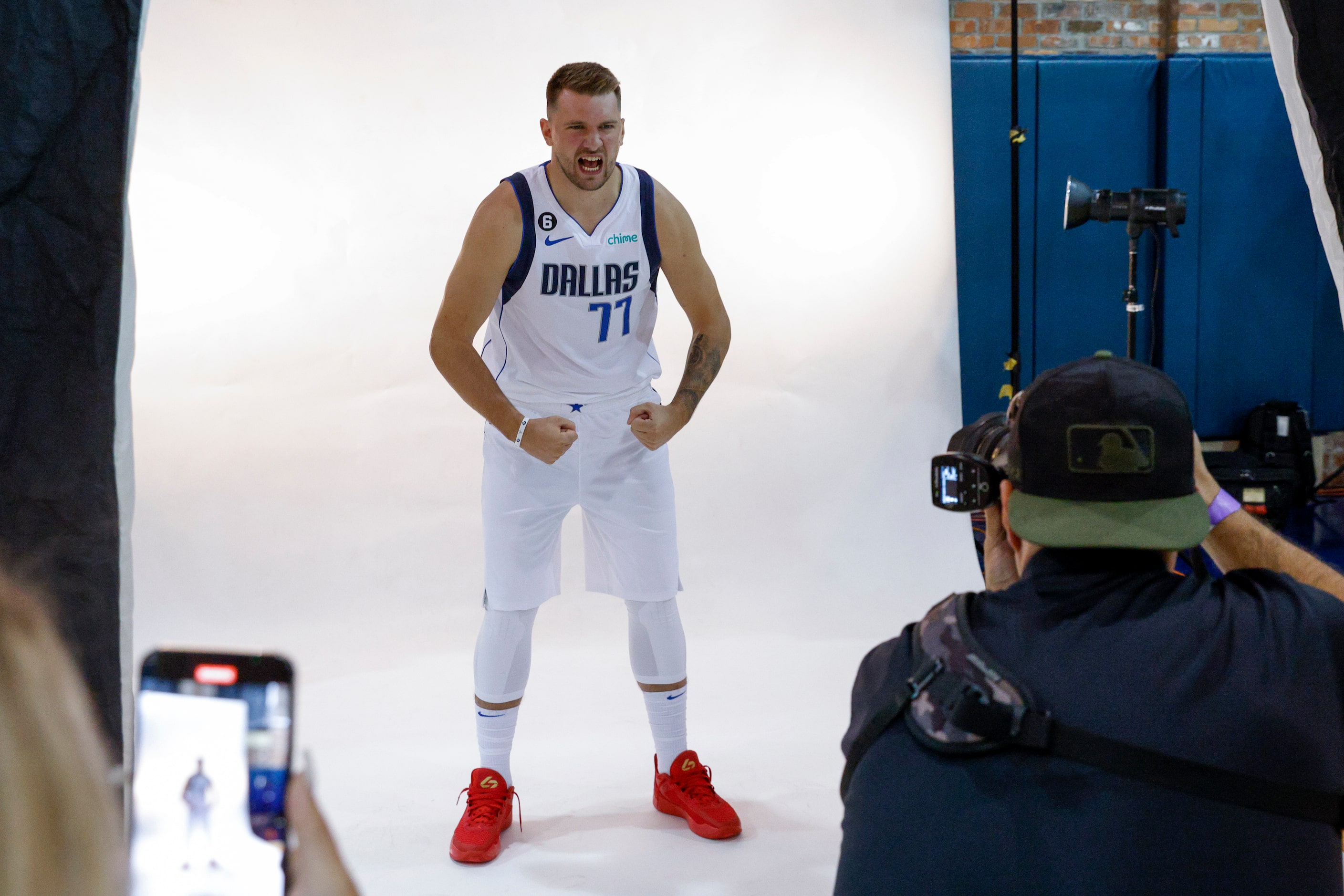 Dallas Mavericks guard Luka Doncic (77) flexes for a portrait during the Mavericks media...