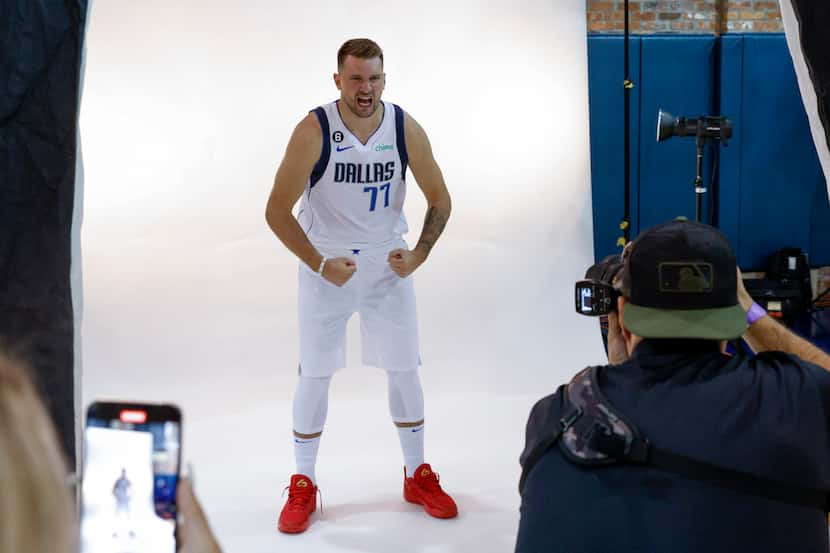 Dallas Mavericks guard Luka Doncic (77) flexes for a portrait during the Mavericks media...