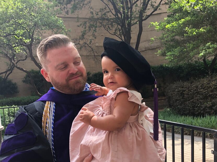 Jim Mullen with his daughter, Gracie, on the day he graduated in 2018 from the University of...